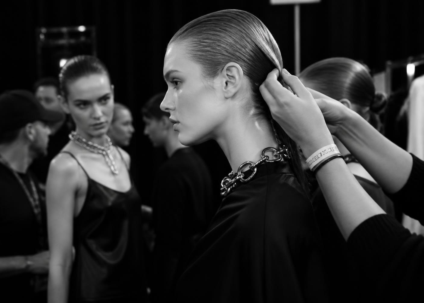 Backstage preparation at a luxury fashion show